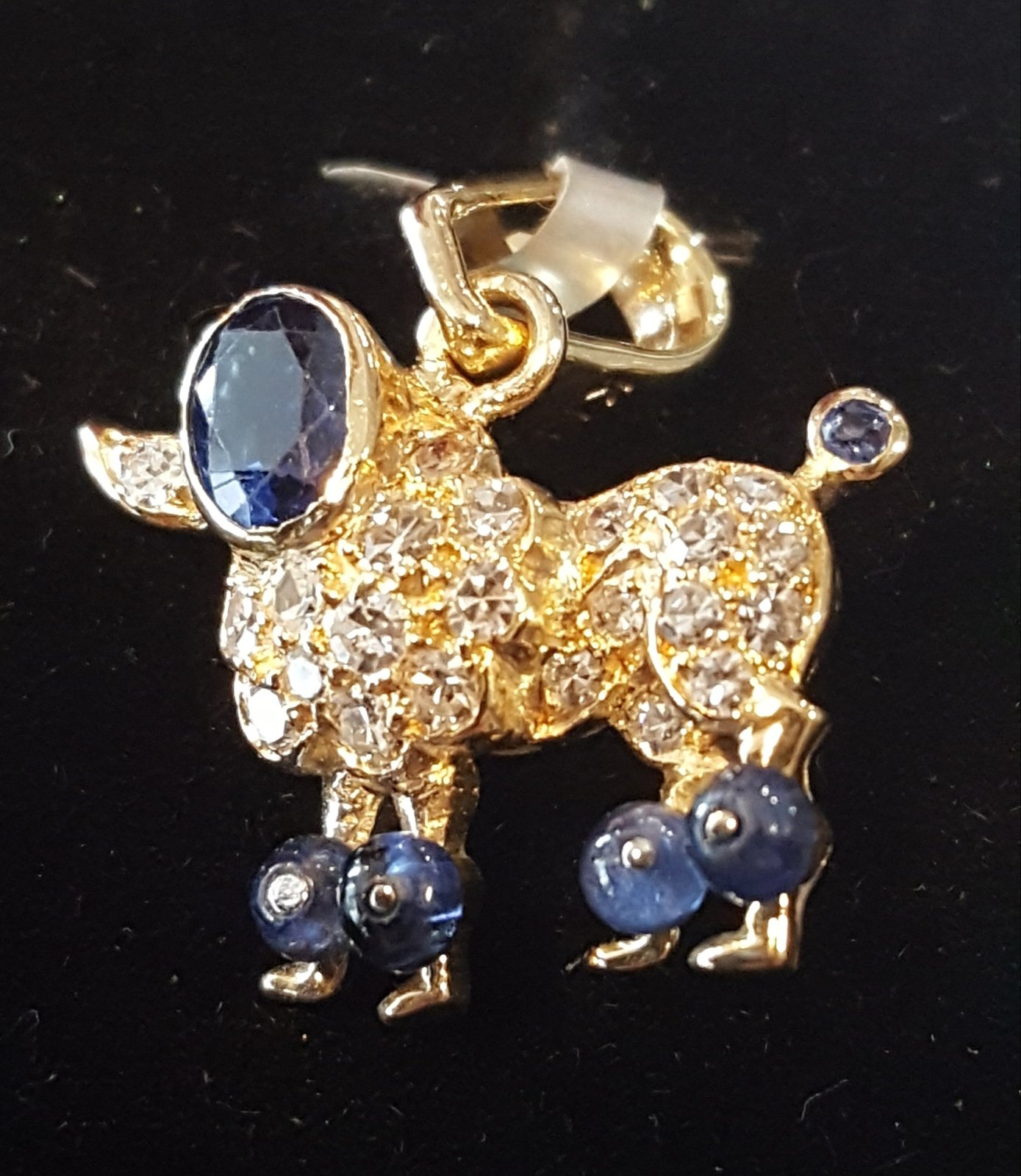 Gold poodle pendant with sapphires